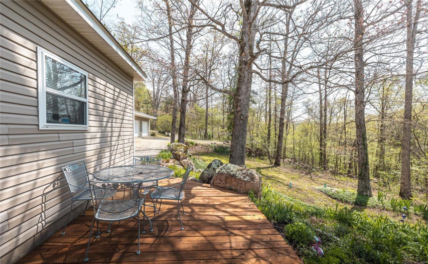Wooden terrace with outdoor dining space