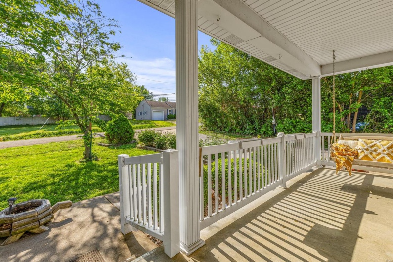 View of front porch featuring covered porch