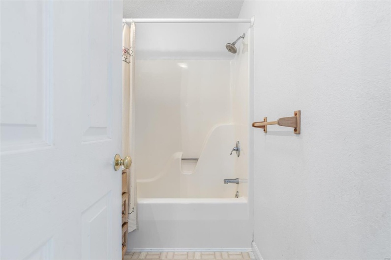 Bathroom with shower / bath combination