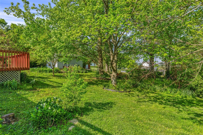 View of yard with a deck