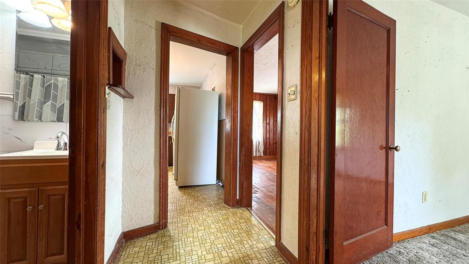 Hallway from office and primary bedroom