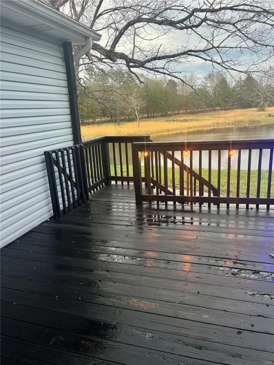 Deck featuring a water view