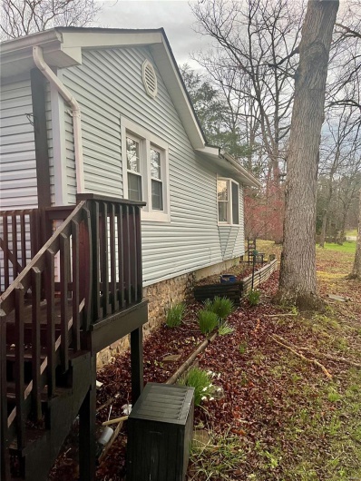 View of home's exterior with a deck