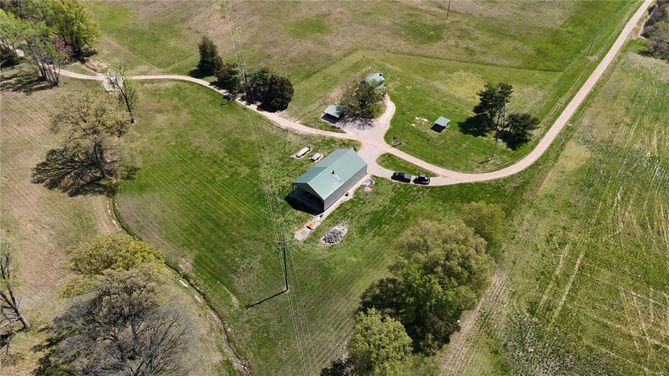 Birds eye view of property featuring a rural view