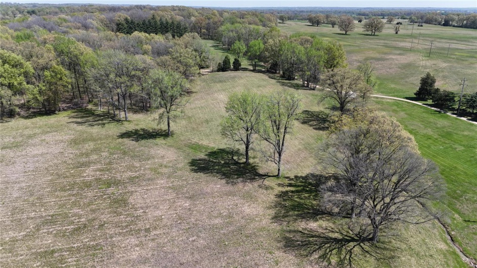 Birds eye view of property featuring a rural view