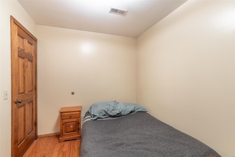 Bedroom with light wood-type flooring