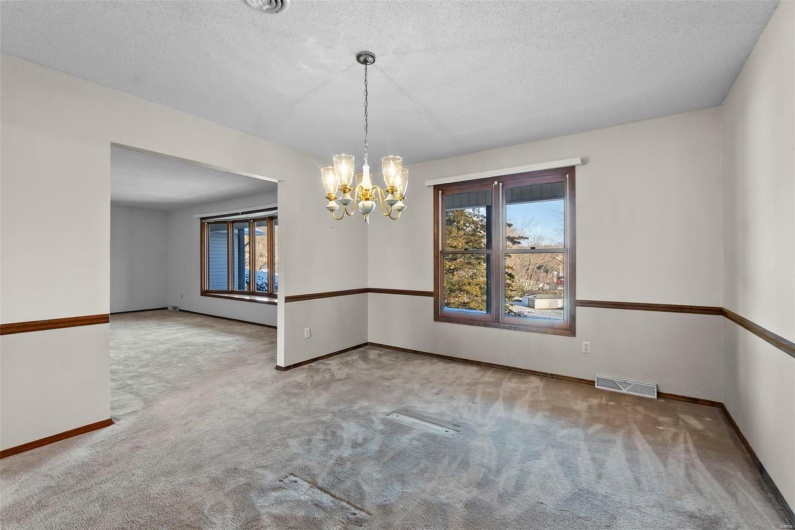 Separate formal dining room open to breakfast room and formal living room