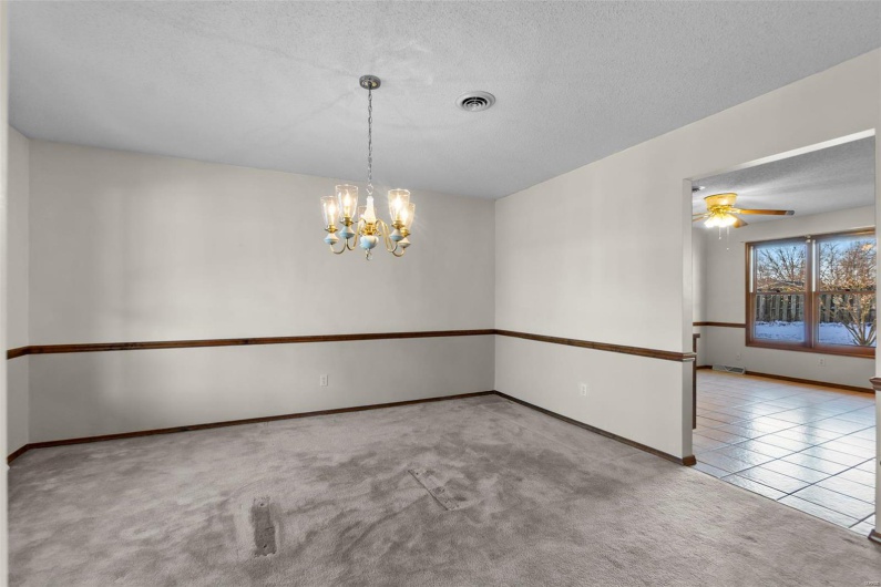 Separate formal dining room open to breakfast room and formal living room