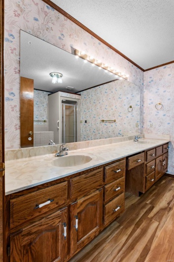 Primary full bathroomfeatures new flooring