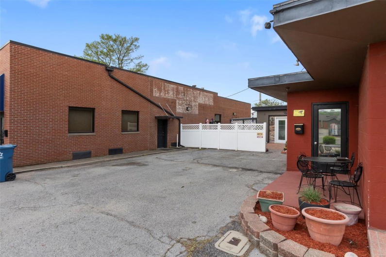 Left side of building with parking