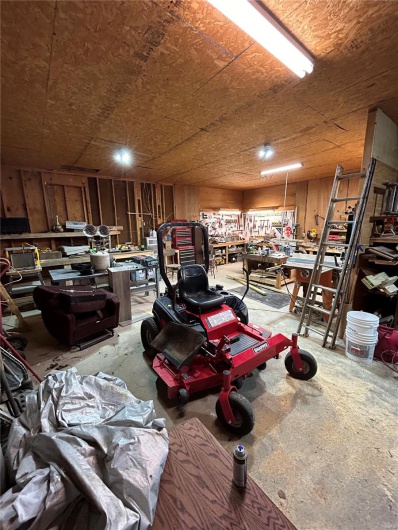Garage featuring a workshop area