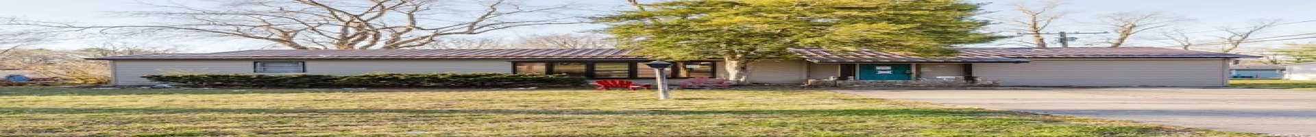 Residential For Sale Single story home with a front lawn and metal roof