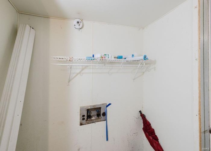 Laundry room featuring laundry area and hookup for a washing machine