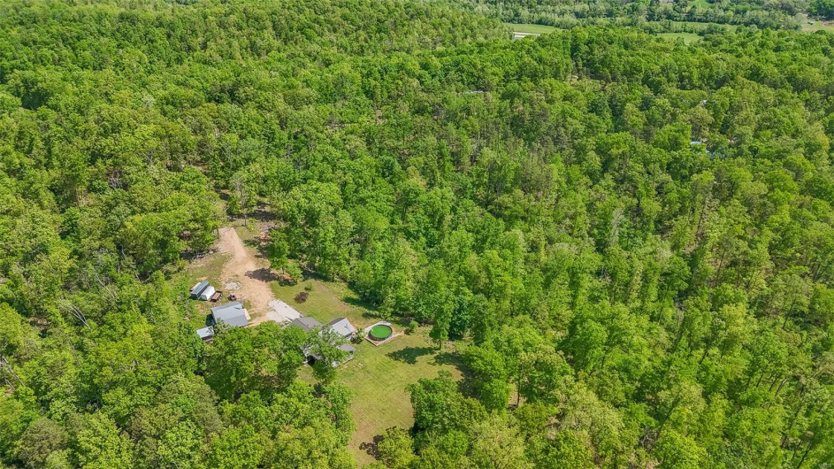 Bird's eye view featuring a wooded view