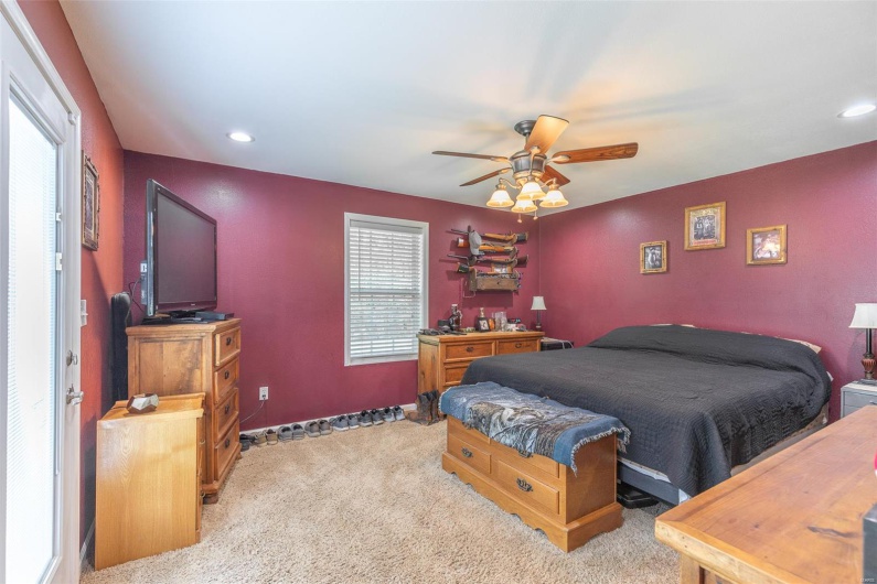 Bedroom featuring recessed lighting, a ceiling fan, and carpet