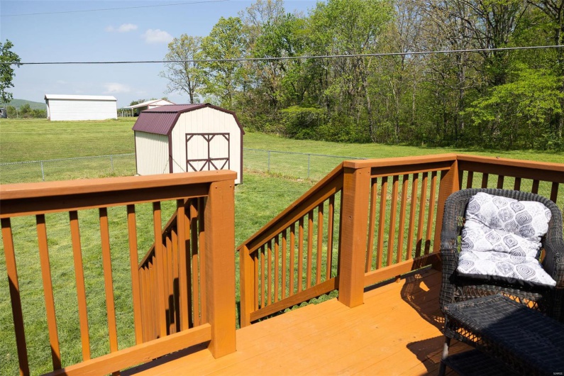 Deck, a storage unit, an outbuilding, yard