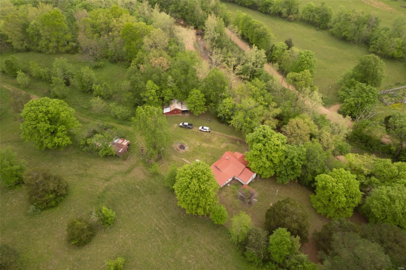 Birds eye view of property featuring a rural view