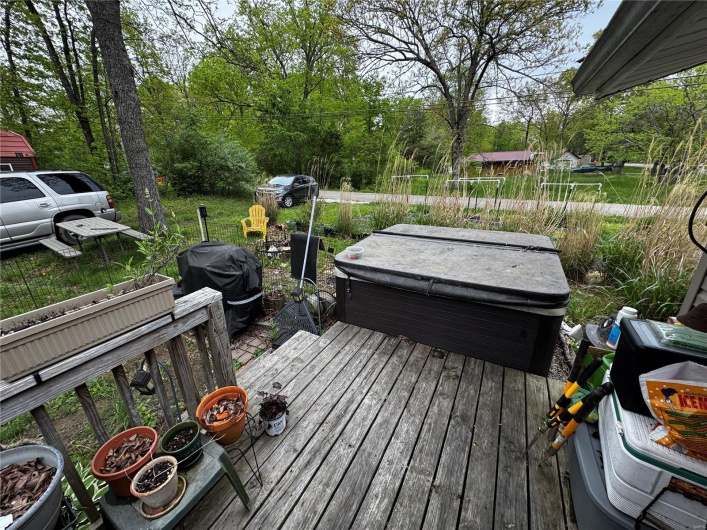 Deck featuring a hot tub