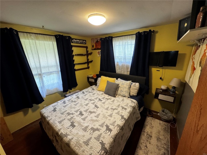 Bedroom with baseboards