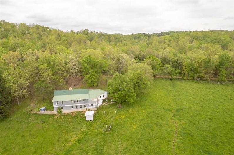 Drone / aerial view featuring a view of trees