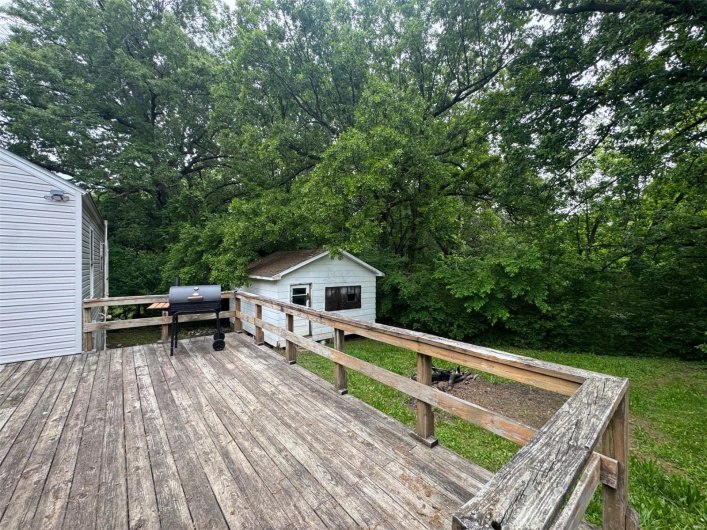 Deck with an outdoor structure