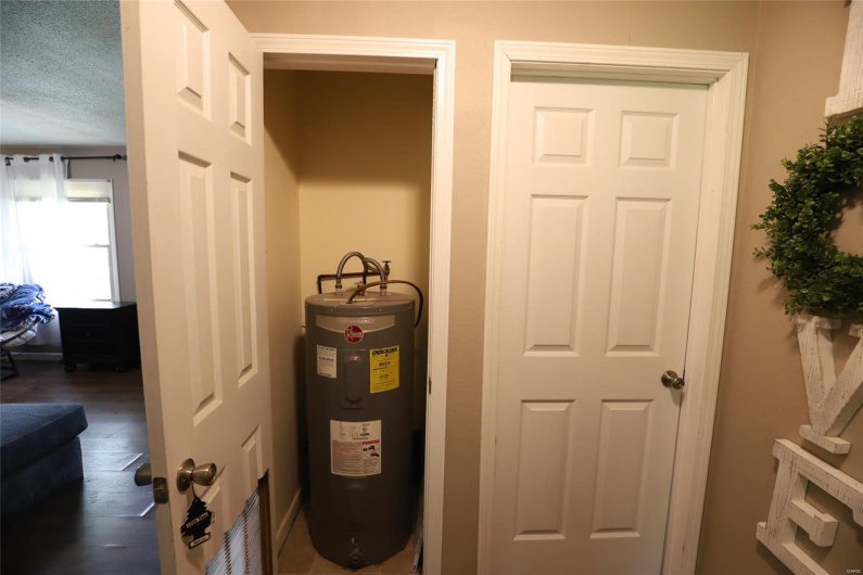 Electric Water Heater in the closet next to Bedroom #1 