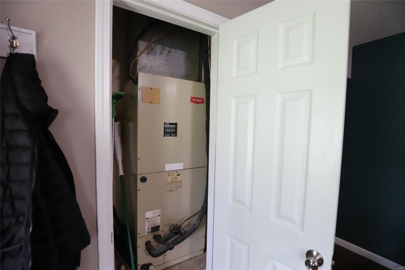 Utility Closet in the living room contains the Furnace 