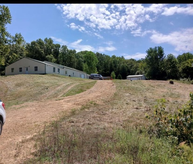View of yard with a forest view