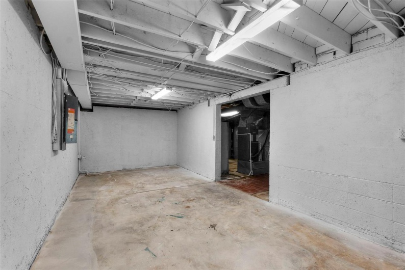 Unfinished basement with heating unit