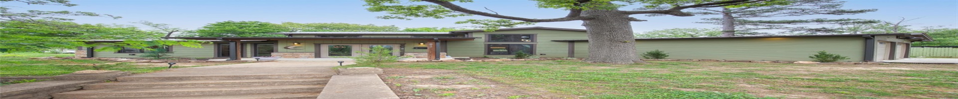 Residential For Sale View of front of house with french doors and stone siding
